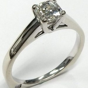 Estate Diamond Engagement Ring 
18 Karat White Estate Engagement Ring 
Finger Size 6.5 Gram Weight 3.01 
1 Center Diamond 0.76ct Shape: Cushion; Clarity: SI1; Colour: H/I; IGI 30059583C 0.76