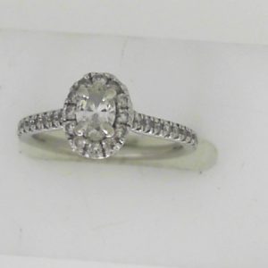 Estate Diamond Engagement Ring 
14 Karat White Estate Engagement Ring 
Finger Size 4.75 Gram Weight 2.3 
1 Center Diamond 0.20ct Shape: Oval; Clarity: I2; Colour: I With 32 Round Diamonds 0.30 ctw 0.5