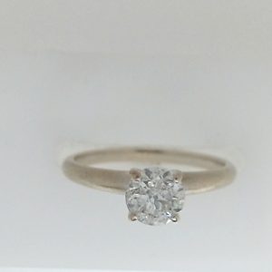 Estate Diamond Engagement Ring 
14 Karat White Estate Engagement Ring 
Finger Size 6.5 Gram Weight 2.2 
1 Center Diamond 0.70ct Shape: Round; Clarity: I3; Colour: I 0.7