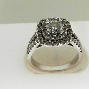 Estate Diamond Engagement Ring 
14 Karat White Estate Engagement Ring 
 Gram Weight 5 
68 Center Diamonds Shape: Round; Clarity: SI1; Colour: H 0.55