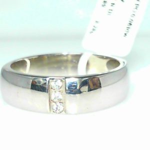 Diamond Ring- Men's 
14 Karat White Men's Diamond Ring 
Finger Size 10 Gram Weight 8.28 
3 Center Diamonds Shape: Round 0.06