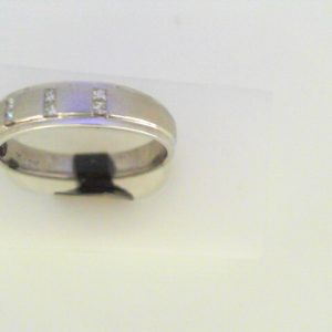 Diamond Ring- Men's 
10 Karat White Men's Diamond Ring 
Finger Size 10 Gram Weight 3.27 
6 Center Diamonds Shape: Round 0.12