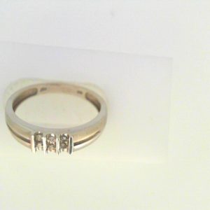 Diamond Ring- Men's 
10 Karat White Men's Diamond Ring 
Finger Size 10 Gram Weight 1.65 
 Center Diamond Shape: Round