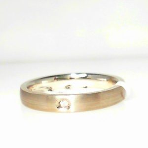 Diamond Ring- Men's 
14 Karat White Men's Diamond Ring 
Finger Size 10 Gram Weight 5.68 
 Center Diamond Shape: Round