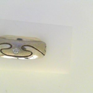 Estate Diamond Ring - Men's 
14 Karat White Estate Diamond Ring 
Finger Size 10.5 Gram Weight 10.2 
 Center Diamond Shape: Round 0.12