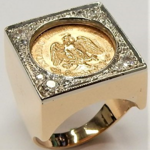 Estate Diamond Ring - Men's 
14 Karat Yellow/White Estate Diamond Ring 
Finger Size 6 Gram Weight 10.8 
 Center Diamond Shape: Round 0.2