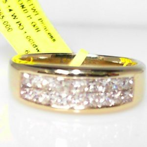 Estate Diamond Ring - Men's 
14 Karat White Estate Diamond Ring 
Finger Size 8.5 Gram Weight 6.72 
18 Center Diamonds Shape: Princess; Clarity: I1; Colour: G/H 1
