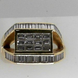 Estate Diamond Ring - Men's 
18 Karat Yellow Estate Diamond Ring 
Finger Size 7.75 Gram Weight 8.83 
60 Center Diamonds Shape: Various Shapes; Clarity: VS; Colour: G 1.5