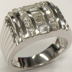 Estate Diamond Ring - Men's 
14 Karat White Estate Diamond Ring Width 13.2mm 
Finger Size 10.75 Gram Weight 17 
17 Center Diamonds Shape: Various Shapes; Clarity: VS-SI; Colour: H 1.04