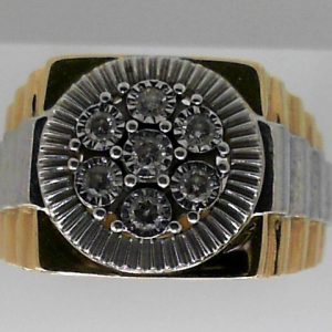 Estate Rolex Style Diamond Ring - Men's
10 Karat Yellow/White Estate Diamond Ring
Finger Size 10 Gram Weight 8
7 Center Diamonds Shape: Round; Clarity: I2; Colour: K 0.25