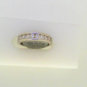 Diamond Wedding/Anniversary Ring 
14 Karat White Wedding/Anniversary Ring 
Finger Size 4.5 Gram Weight 2.9 
10 Center Diamonds Shape: Round; Clarity: I1; Colour: I/J 0.4