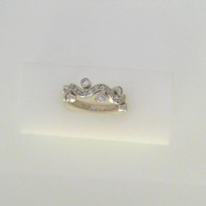 Diamond Wedding/Anniversary Ring 
14 Karat White Wedding/Anniversary Ring 
Finger Size 6.5 
 Center Diamond Shape: Round 0.59