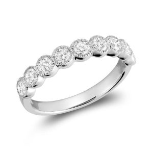 Diamond Wedding/Anniversary Ring 
14 Karat White Wedding/Anniversary Ring Width 2.3mm 
Finger Size 6.5 Gram Weight 2.3 
9 Center Diamonds Shape: Round 0.74