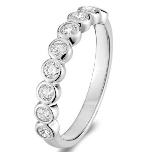 Diamond Wedding/Anniversary Ring 
14 Karat White Wedding/Anniversary Ring 
Finger Size 6.5 Gram Weight 2 
9 Center Diamonds Shape: Round 0.52