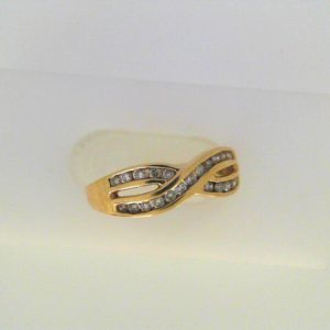 Estate Diamond Anniversary Ring 
14 Karat Yellow Estate Anniversary Ring Width 1.8mm 
Finger Size 7 Gram Weight 2.3 
23 Center Diamonds Shape: Round 0.25