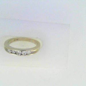 Estate Diamond Anniversary Ring 
14 Karat White Estate Anniversary Ring 
Finger Size 4.5 Gram Weight 2.6 
 Center Diamond Shape: Round; Clarity: I1; Colour: I 0.22