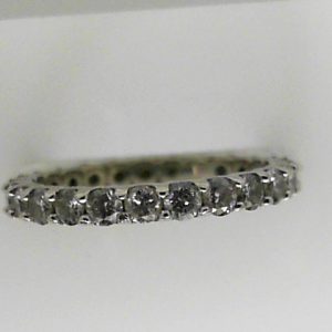 Estate Diamond Anniversary Ring 
14 Karat White Estate Anniversary Ring 
Finger Size 6.75 Gram Weight 1.9 
24 Center Diamonds Shape: Round; Clarity: I1; Colour: I 1.4