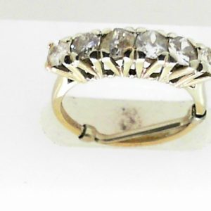 Estate Diamond Anniversary Ring 
18 Karat White Estate Anniversary Ring 
Finger Size 6.5 Gram Weight 3.4 
6 Center Diamonds Shape: EURO Cut; Clarity: I1; Colour: I 1.25
4 Diamonds are chipped