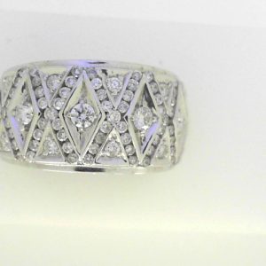 Diamond Dinner Ring - Women's 
10 Karat White Dinner Ring 
Finger Size 7 
80 Center Diamonds Shape: Round 0.7