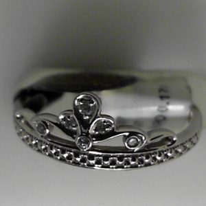 Diamond Dinner Ring - Women's 
10 Karat White Dinner Ring 
Finger Size 6.75 
34 Center Diamonds Shape: Round 0.17