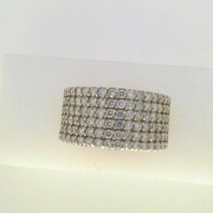 Diamond Dinner Ring - Women's 
14 Karat White Dinner Ring Width 6.3mm 
Finger Size 6.75 Gram Weight 8.6 
108 Center Diamonds Shape: Round 1.5