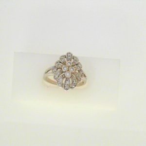 Diamond Dinner Ring - Women's 
18 Karat White Dinner Ring Width 1.7mm 
Finger Size 7.75 Gram Weight 4.6 
 Center Diamond Shape: Round 0.33