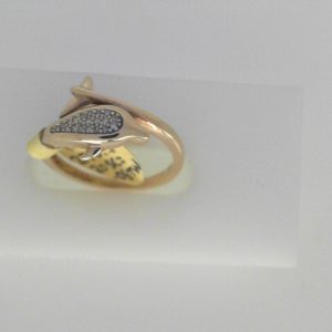 Estate Diamond Dinner Ring - Women's 
10 Karat Yellow Estate Dinner Ring Width 1.58mm 
Finger Size 5.5 Gram Weight 2.23 
20 Center Diamonds Shape: Round 0.06