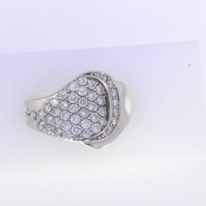 Estate Diamond Dinner Ring - Women's 
14 Karat White Estate Dinner Ring 
Finger Size 5.75 Gram Weight 5.3 
42 Center Diamonds Shape: Round; Clarity: I1; Colour: I 1