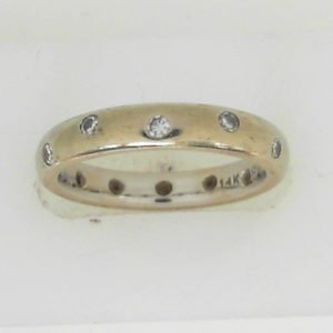 Estate Diamond Dinner Ring - Women's 
14 Karat White Estate Dinner Ring 
Finger Size 7 Gram Weight 5 
12 Center Diamonds Shape: Round; Clarity: VS; Colour: H 0.33