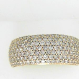 Estate Diamond Dinner Ring - Women's 
10 Karat Yellow Estate Dinner Ring 
Finger Size 10 Gram Weight 4.72 
180 Center Diamonds Shape: Round