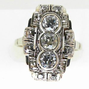 Estate Diamond Dinner Ring - Women's 
14 Karat White Estate Dinner Ring 
Finger Size 8 Gram Weight 4.1 
1 Center Diamond; 0.40ct Shape: EURO Cut; Clarity: VS; Colour: H/I With 2 EURO Cut Diamonds 0.60 ctw and 12 EURO Cut Diamonds 0.36 ctw 1.36