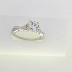 Diamond Semi-Mount Ring 
14 Karat White Ring 
Finger Size 7 Gram Weight 2.82