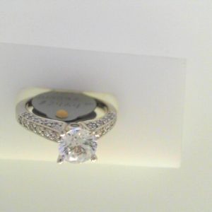 Diamond Semi-Mount Ring 
14 Karat White Ring 
Finger Size 6.25 
1 Center Cubic Zirconium 1.00ct Shape: Round Round Diamond 0.45 ctw 1.45