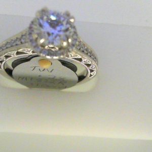 Diamond Semi-Mount Ring 
14 Karat White Ring 
Finger Size 6.25 
1 Center Cubic Zirconium 1.00ct Shape: Round Round Diamond 0.28 ctw 1.28