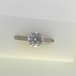 Diamond Semi-Mount Ring 
14 Karat White Ring 
Finger Size 6.25 
1 Center Cubic Zirconium 1.00ct Shape: Round Round Diamond 0.15 ctw 1.15