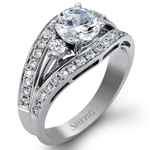 Diamond Semi-Mount Ring 
18 Karat White Ring 
Finger Size 6 
 Center Diamond Shape: Round; Clarity: VS1; Colour: F/G 2.67