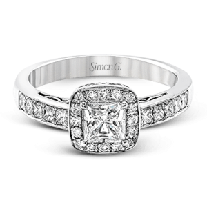 Diamond Semi-Mount Ring 
18 Karat White Ring 
Finger Size 6 
 Center Diamond Shape: Round; Clarity: VS1; Colour: F/G 0.5