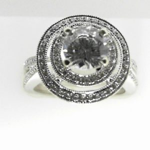 Estate Diamond Semi-Mount 
18 Karat White Estate Semi-Mount Ring 
Finger Size 6 
1 Center Cubic Zirconium 1.00ct Shape: Round With 99 Round Diamonds 0.50 ctw 1.5
