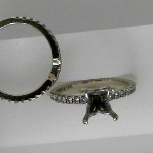 Estate Diamond Semi-Mount 
18 Karat White Estate Semi-Mount Ring Width 1.7mm 
Finger Size 6 Gram Weight 5.1 
45 Center Diamonds Shape: Round; Clarity: SI; Colour: G/H 0.63