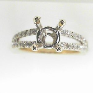 Estate Diamond Semi-Mount 
18 Karat White Estate Semi-Mount Ring 
Finger Size 5.5 Gram Weight 3.2 
28 Center Diamonds Shape: Round; Clarity: SI1; Colour: G 0.25