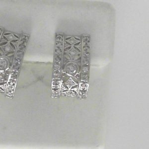 Diamond Earrings 
14 Karat White Diamond Earrings 
Gram Weight 8 
54 Center Diamonds Shape: Round 1