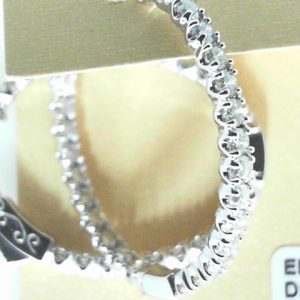 Diamond Earrings 
14 Karat White Diamond Earrings 
Gram Weight 5.81 
50 Center Diamonds Shape: Round 2