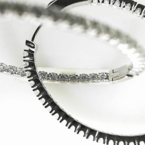 Diamond Earrings 
14 Karat White Diamond Earrings 
 
68 Center Diamonds Shape: Round 1.78