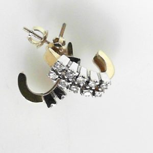 Estate Diamond Earrings 
14 Karat Yellow/White Estate Diamond Earrings 
Gram Weight 3.4 
20 Center Diamonds Shape: Round 0.4