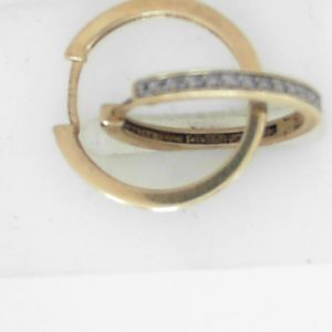 Estate Diamond Earrings 
10 Karat Yellow Estate Diamond Earrings 
Gram Weight 2.6 
32 Center Diamonds Shape: Round 0.15