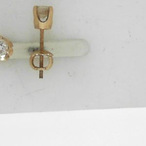 Estate Diamond Earrings 
14 Karat Yellow Estate Diamond Earrings 
Gram Weight 0.84 
2 Center Diamonds Shape: Round; Clarity: I2; Colour: I/J 0.42