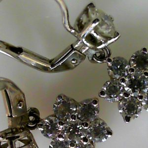 Estate Diamond Earrings 
14 Karat White Estate Diamond Earrings 
Gram Weight 4.6 
2 Center Diamonds Shape: Round; Clarity: VS; Colour: H With 14 Round Diamonds 1.50 ctw 2.26