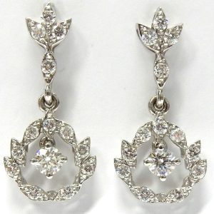 Estate Diamond Earrings 
18 Karat White Estate Diamond Earrings 
Gram Weight 6.9 
28 Center Diamonds Shape: Round; Clarity: SI; Colour: G/H 1.53ct. tw.