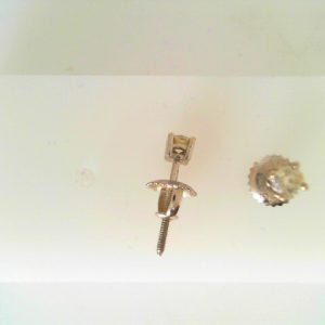 Estate Diamond Earrings 
14 Karat White Estate Diamond Earrings 
 
2 Center Diamonds Shape: Round; Clarity: SI; Colour: H 0.25