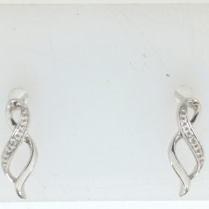 Estate Diamond Earrings 
9 Karat White Estate Diamond Earrings 
Gram Weight 0.84 
2 Center Diamonds Shape: Round